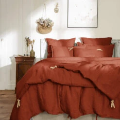 Couvre-lit à Nouettes Lin Lavé -Lematelas Soldes Boutique bout de lit lin orange ambiance